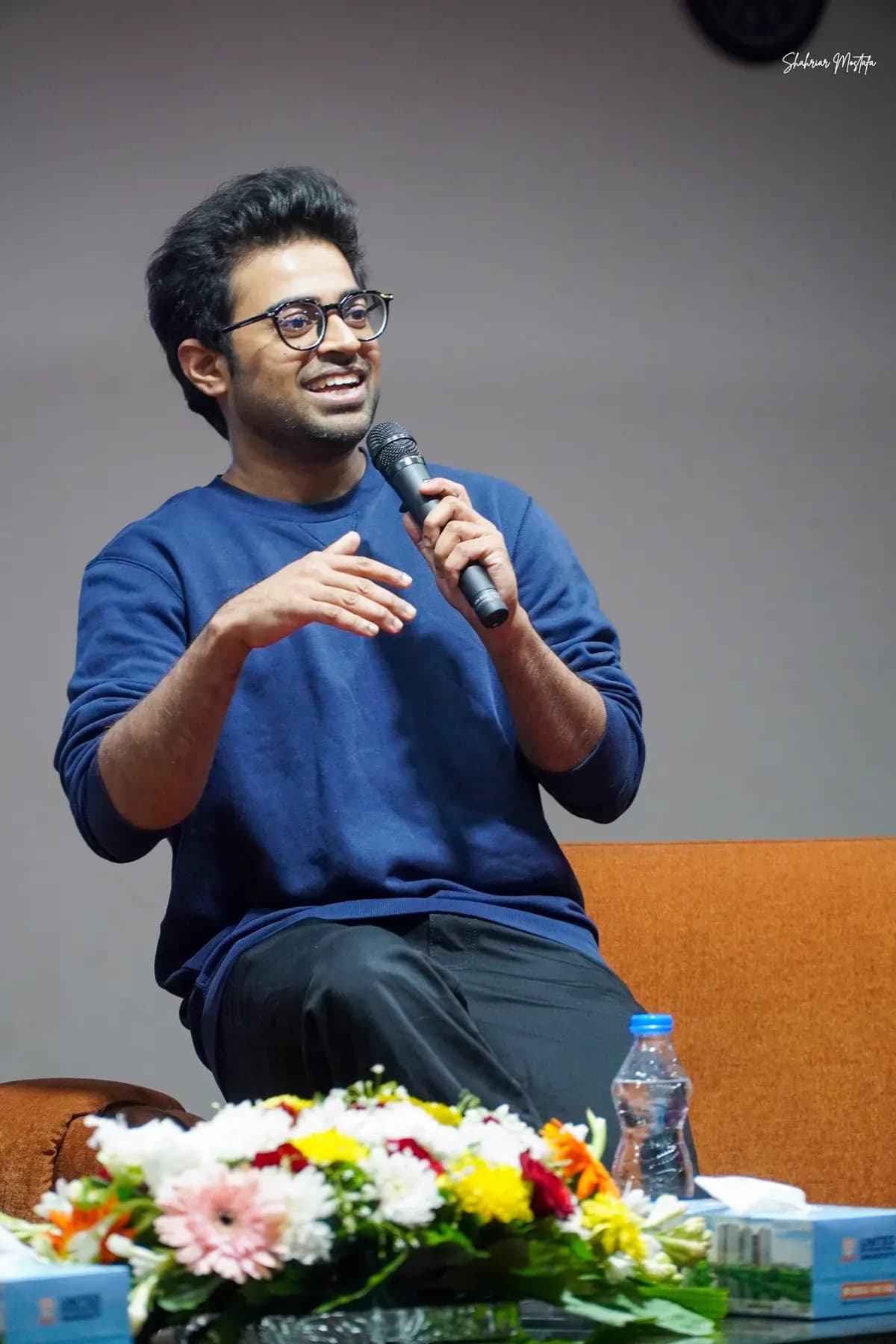 Khalid Farhan speaking on stage